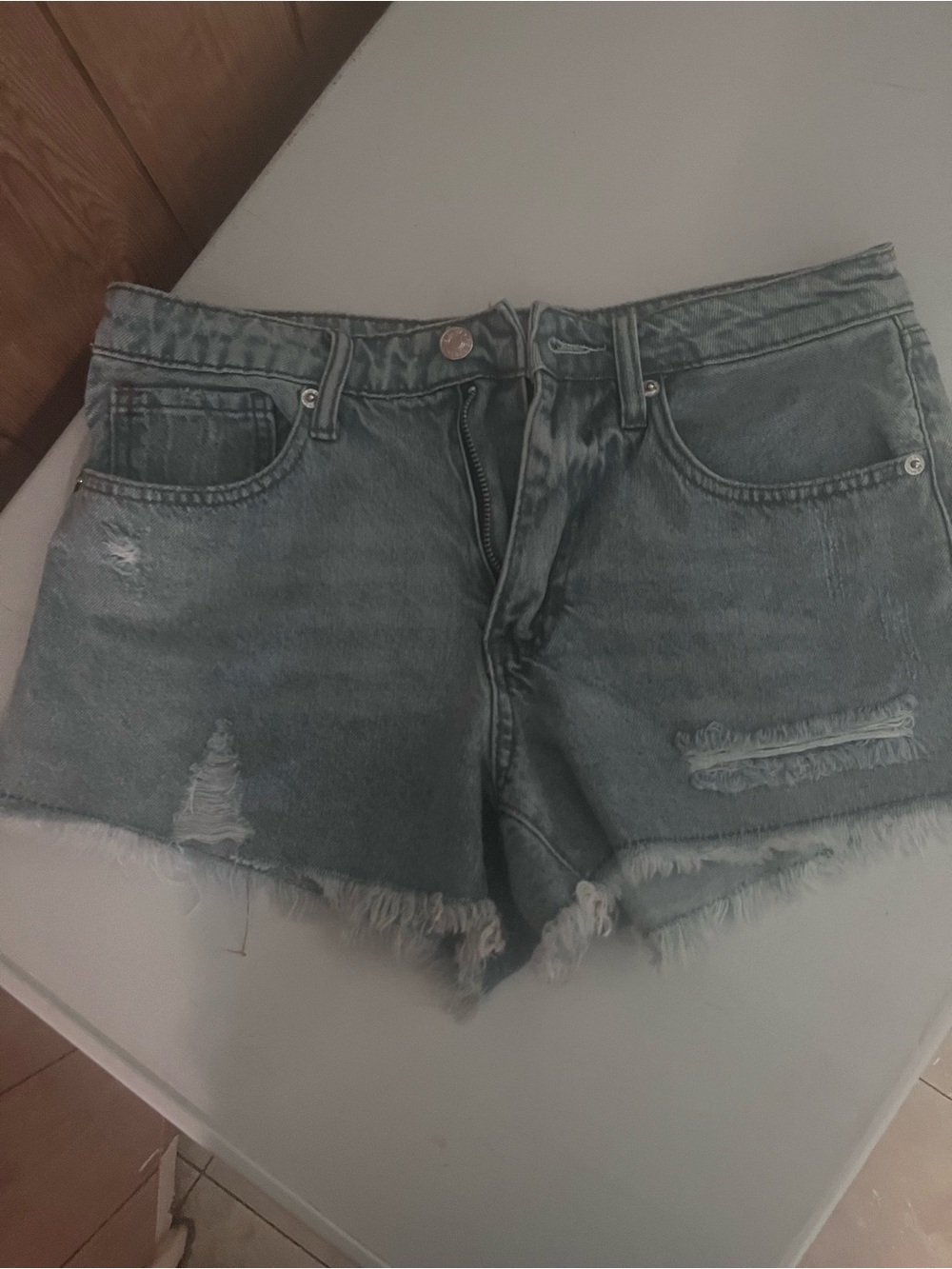 Distressed Light Blue Denim Jean Shorts with Frayed Hem